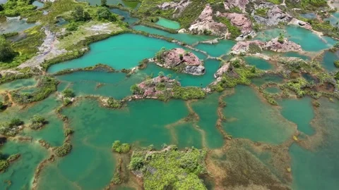 Drone shot soaring above serene turquoise lagoons Vídeos de archivo 344825291