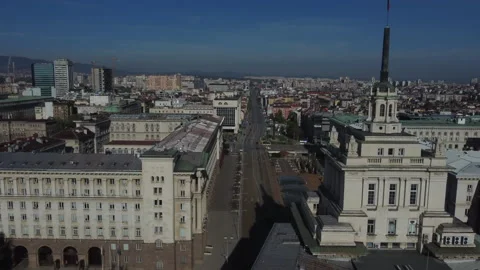 Drone shot of Sofia in Bulgaria - drone is following a street, passing by Stock Footage 224836664