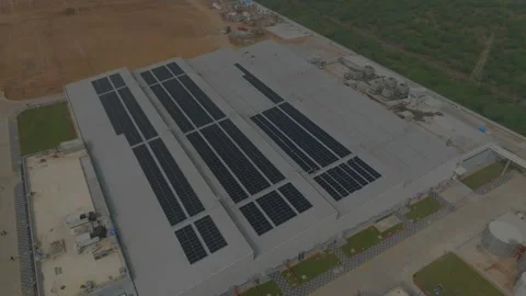 Drone shot Solar panel installation in factory roof top Video stock 272408080