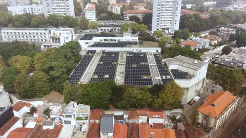 Drone Shot of Solar Panels Array in Suburbs of Porto, Portugal Under Morning Stock Footage 320565448