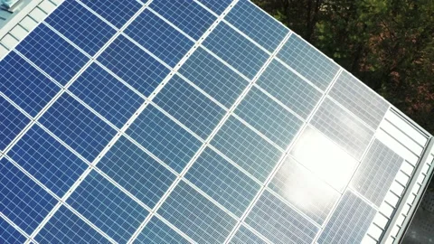 Drone shot at the solar panels installed on the roof of the building Aerial view Stock Footage 235178160