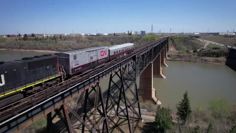 Drone Shot of a Special Train on a Bridge in Edmonton, Alberta, Canada Stock Footage 308388688