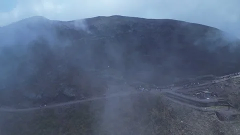 Drone shot of summit and crater of Mount Vesuvius in Italy Stock Footage 328521565