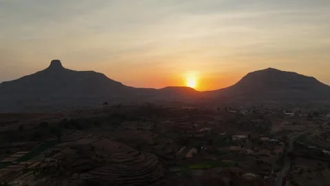 Drone shot of sun set from two mountains. Stock Footage 272621414