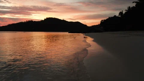 Drone shot of sundown at perfect beach on Seychelles Stock Footage 87110726