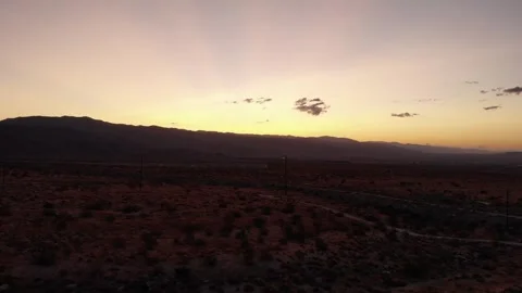 Drone shot at sunrise of Eureka Peak near Joshua Tree National Park California Stock Footage 344906782