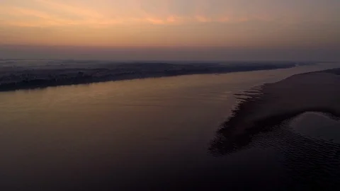 Drone shot sunrise sunset view river and warm tone nurture landscapes. Video stock 129108465