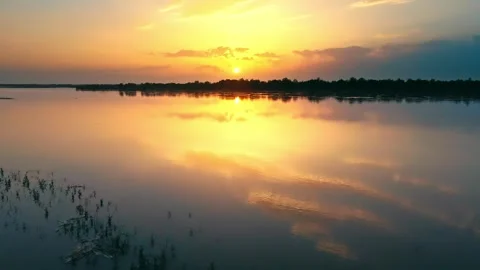 Drone shot sunset and river Stock Footage 258991368