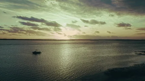 Drone shot of Sunset and Storm Lakes Entrance Stock Footage 294622796