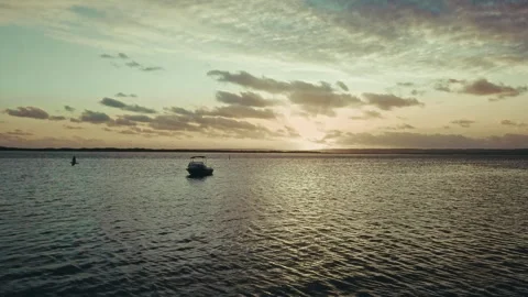 Drone shot of Sunset and Storm Lakes Entrance Stock Footage 294623477