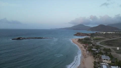 Drone shot of a sunset on the beach, Isla Margarita, Venezuela Stock Footage 261022491