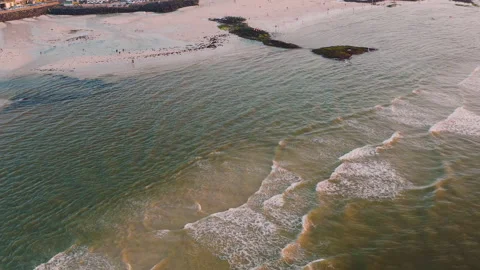 Drone shot. Sunset beaches and rough waves. Stock Footage 138692272