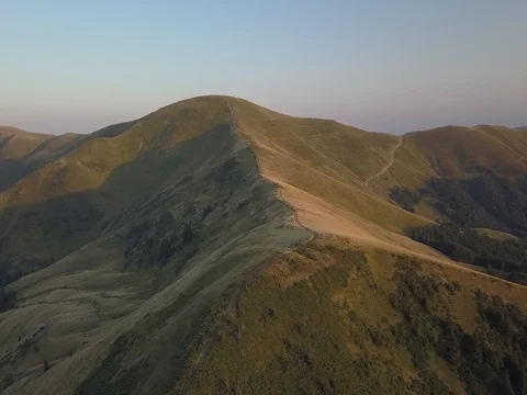 Drone shot: Sunset lits mountain ridge of Carpathian mountains, Ukraine Stock Footage 81911307