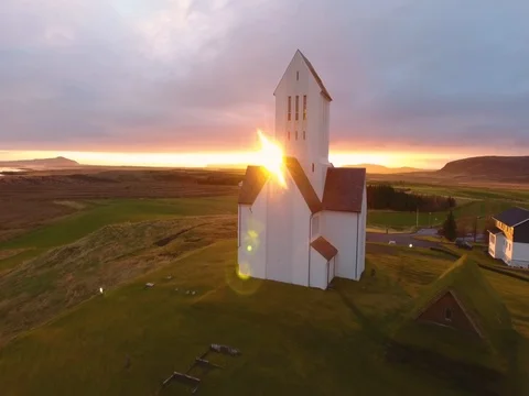 Drone shot sunset little town with church Stock Footage