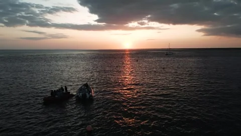 Drone shot of sunset in the ocean Stock Footage 247055577