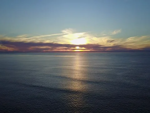 Drone shot of sunset over ocean 스톡 동영상 71166676