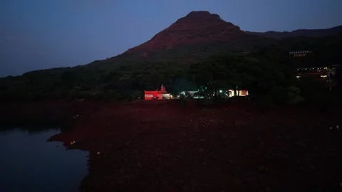 Drone shot of temple at the base of a mountain 4K30 库存影片 332893325