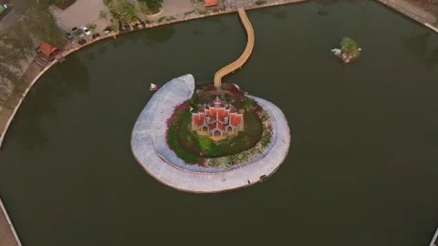 Drone shot of temple standing in tranquil waters, Bangkok Stock Footage 304373902