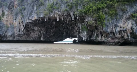 Drone shot through cave Phuket Thailand 스톡 동영상 100488646