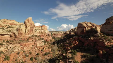 A drone shot through a drive riverbed in the desert in Utah near the mountains. Stock Footage 171513151