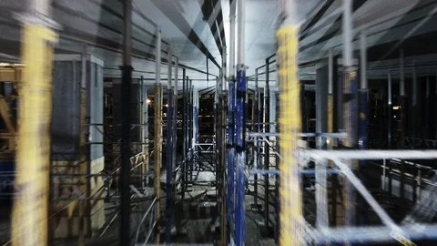 Drone shot through jacks on floor of high rise. Stock Footage 128464164