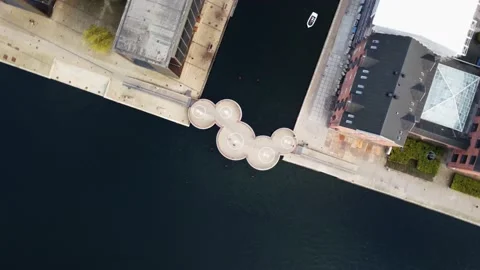 Drone shot top down view goes down turn movement above a bridge in Copenhaguen Stock Footage 221147760