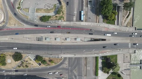 Drone shot - From the top - Trams are arriving in the same time at the bridge Stock Footage 288109223