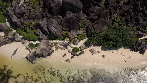 Drone shot: Top view of famous beach on Seychelles, Anse Source d'Argent 動画素材 107581815