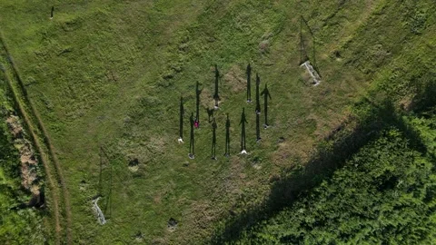 Drone shot top view of how people do exercises in nature Stock Footage 227123568