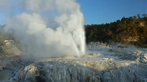 Drone shot tracking around powerful geyser in Rotorua Stock Footage 89805672