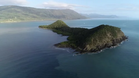 Drone Shot Tracking Backwards Away from Tropical Island Stock Footage 100421319
