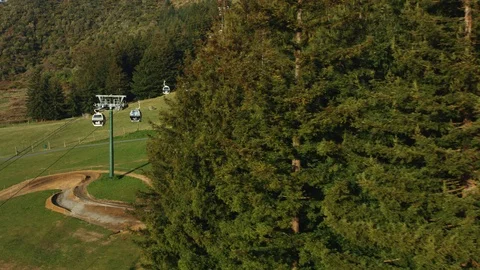 Drone shot tracking over gondolas in Rotorua Stock Footage 89810130