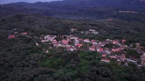 Drone Shot of Traditional Agioi Douloi Village Houses and Church in North Corfu Stock-Footage 336737553