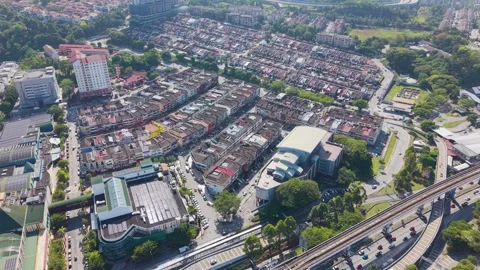 Drone shot of traffic and MRT train near Taman Segar in Cheras, Kuala Lumpur Stock Footage 333359508