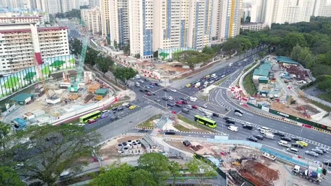 Drone shot of traffic junction with construction works, Singapore Stock Footage 151567876