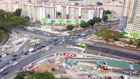 Drone shot of traffic junction with construction works, Singapore Stock Footage 151567906