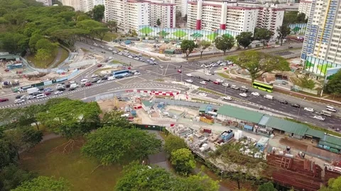 Drone shot of traffic junction with construction works, Singapore Stock Footage 151567965