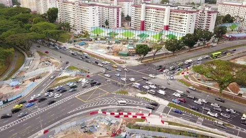Drone shot of traffic junction with construction works, Singapore Stock Footage 151567985