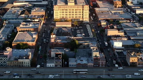 Drone shot of traffic passing through Brooklyn at sunrise Video stock 253878280