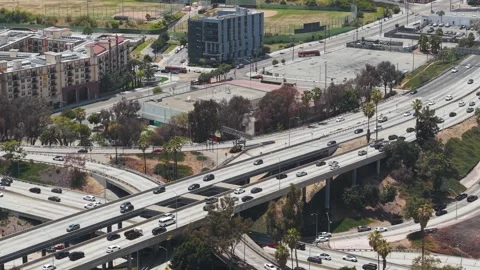 Drone Shot of Traffic on The Stack Four Level Interchange, Highway in Los Stock Footage 339689133