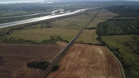 Drone shot of train and fields, 60fps HD Stock Footage 169606023