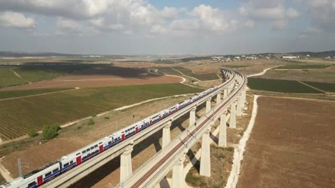Drone Shot of a train crossing a bridge in Israel 库存影片 268727692