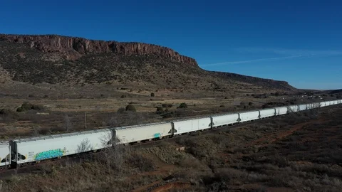 Drone shot of a train in the desert in El Paso, Texas Stock Footage 128656293