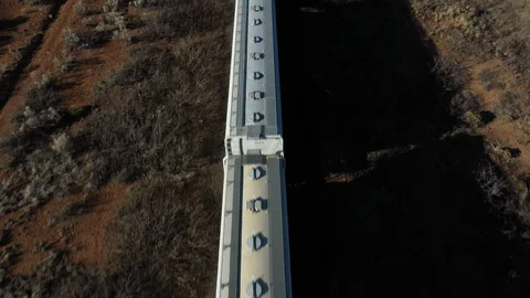 Drone shot of a train in the desert in El Paso, Texas Stock Footage 128658158