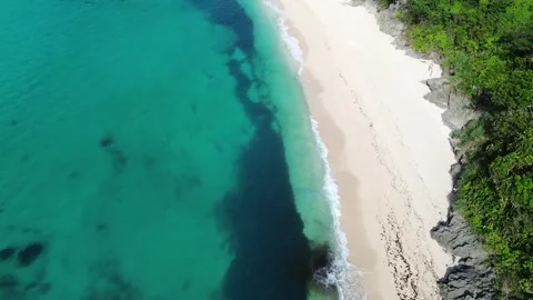 Drone shot of tropical beach Puka Beach Boracay with crystal clear water and Stock-Footage 334050116