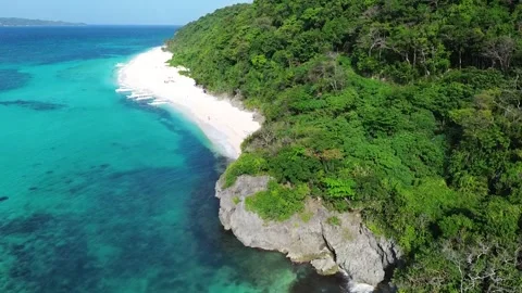 Drone shot of tropical beach Puka Beach Boracay with crystal clear water and Stock Footage 334050462