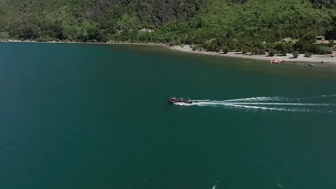 Drone Shot of Turquoise River Flowing Through Mountain Landscape Stock Footage 312845596