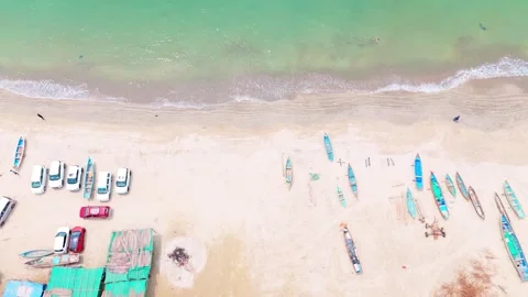 Drone shot Turquoise Waters Border Colorful Beach Vessels Stock Footage 305365945