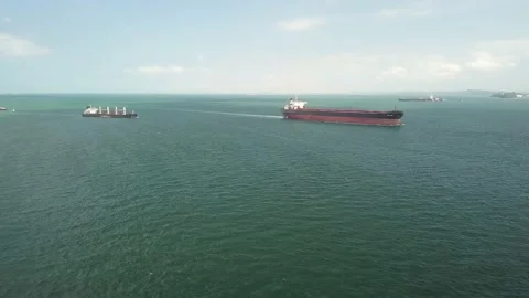 Drone shot of two bulk carriers sailing Singapore Straits Stock Footage 151568362