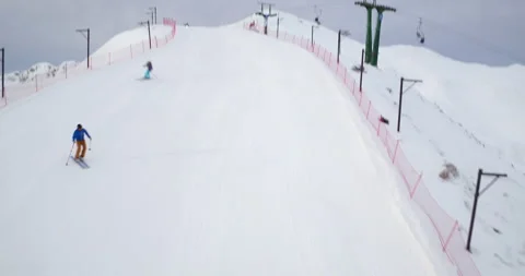 Drone Shot Of Two People Skiing Stock Footage 140033308
